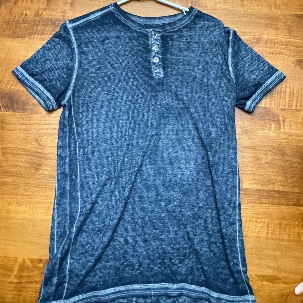 Buckle T shirt, blue. Good condition.